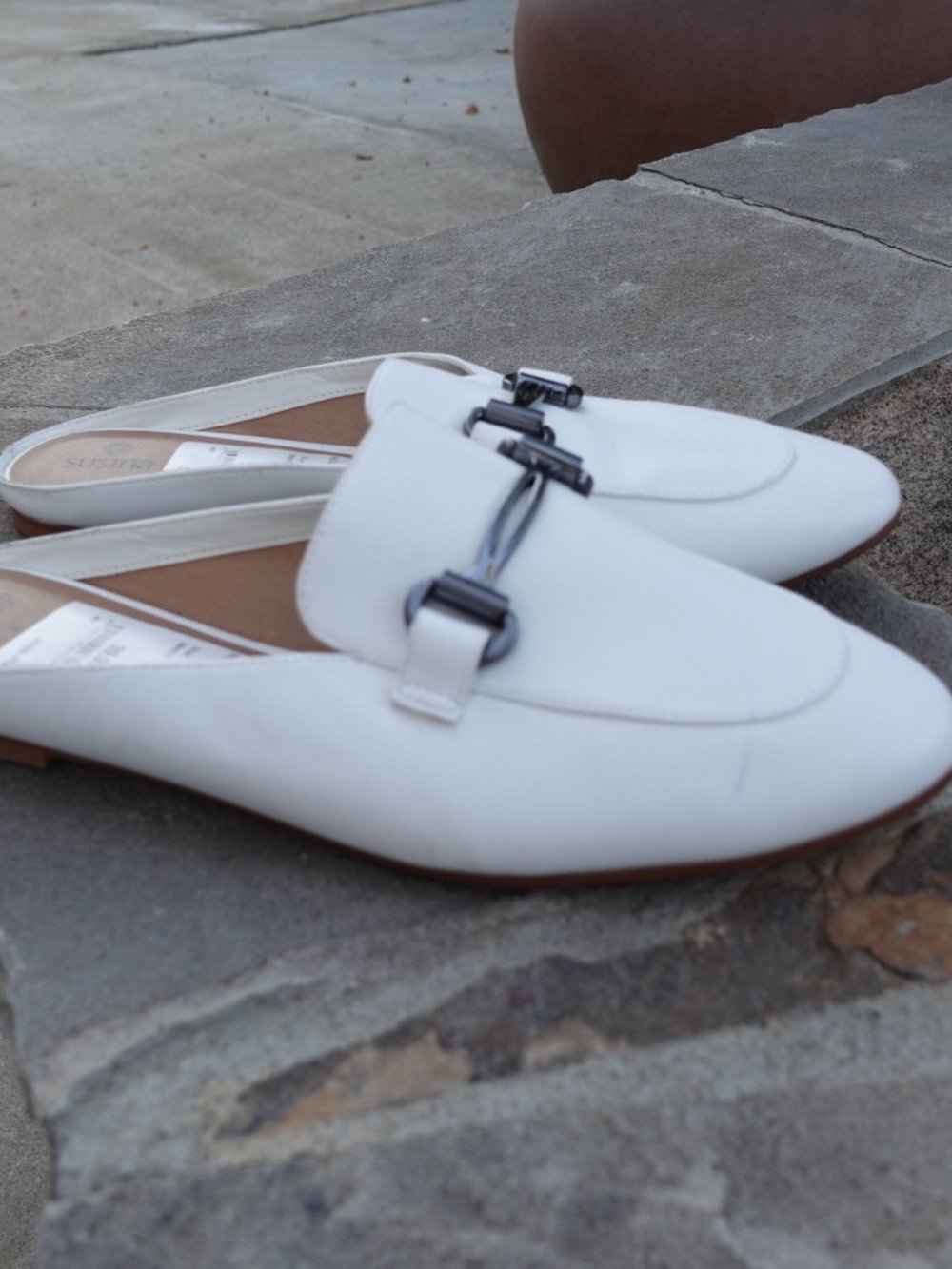 Brand new white Susina loafer mule with silver buckle hardware.